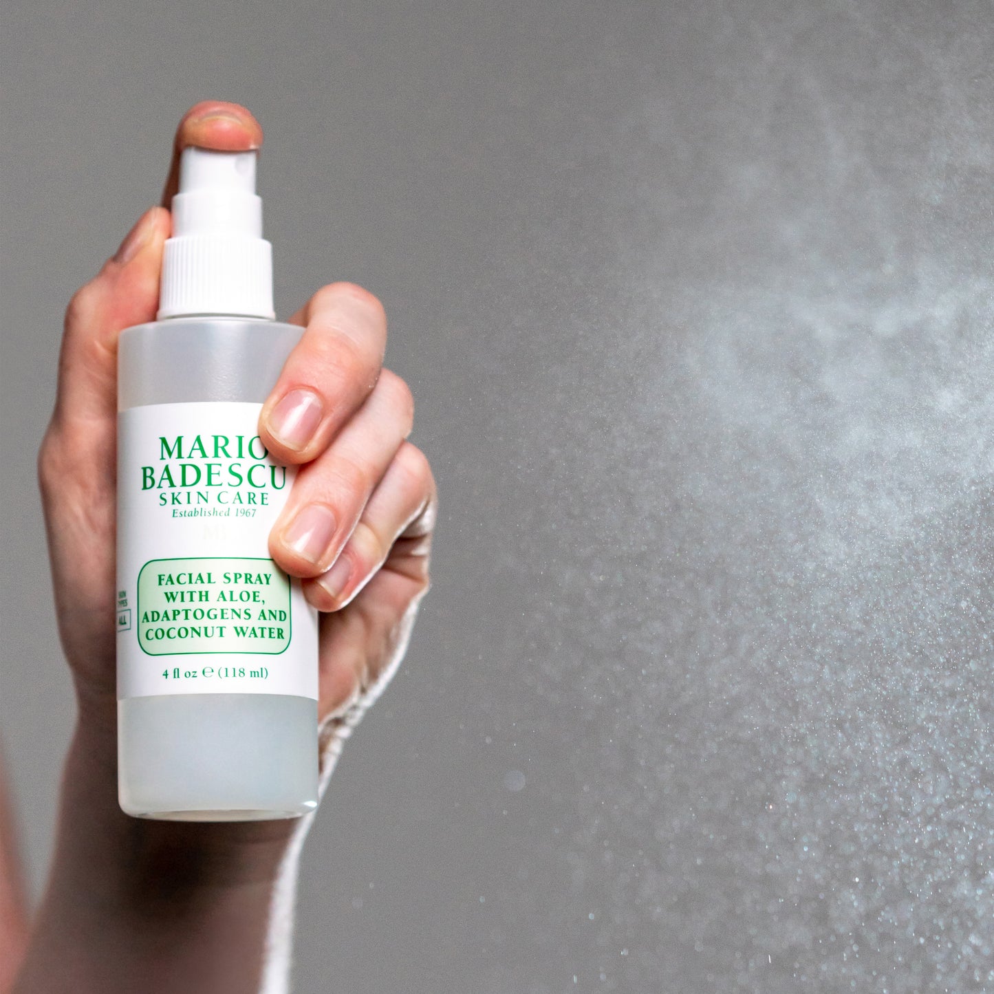 Facial Spray With Aloe, Adaptogens, Coconut Water being misted