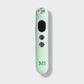 Mint green electronic device with 'MB' logo on a light gray background