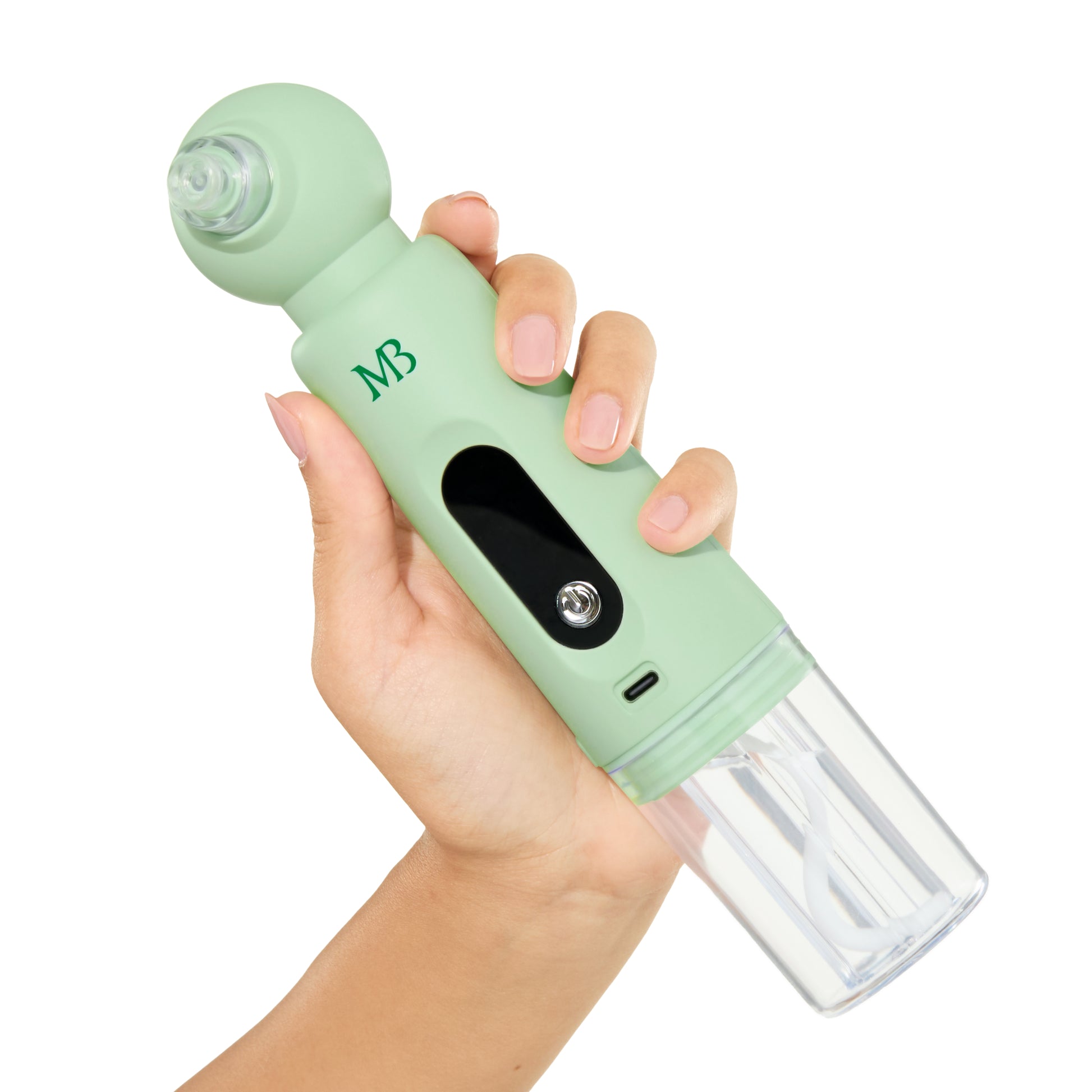 Hand holding a green handheld device with a clear attachment on a white background